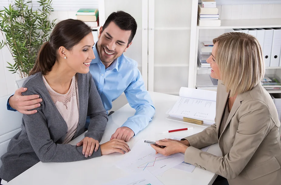 Professional business meeting_ young couple as customers and an adviser for finance, inves Professional business meeting_ young couple as customers and an adviser for finance, inves